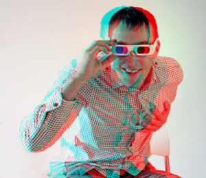 Man wearing 3D glasses